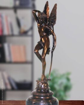 Figure of bronze. Fairy with bow. 65 x 22 x 22 cm.