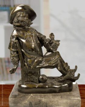 Figure of bronze. Musketeer with jug. 21x13x30cm