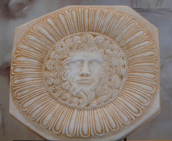 Roman sculpture with representation of the Sun.  20 x 20 cm.