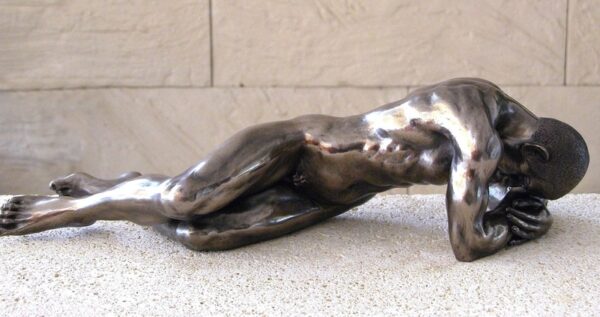 Figure of a man lying down (30 cm)