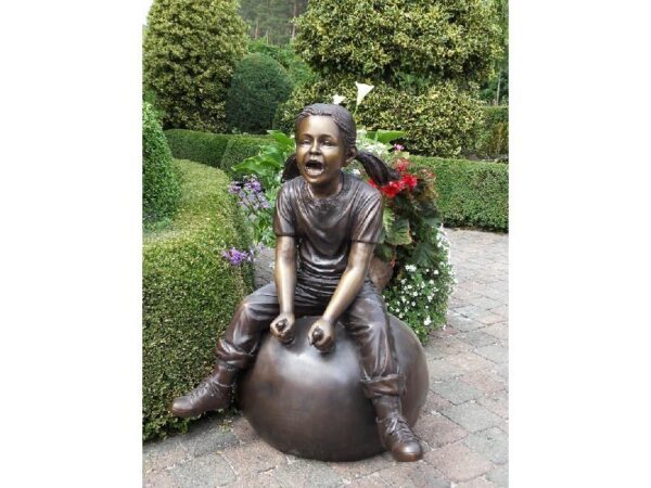 Bronze figure. Girl with ball. 92 x 64 x 64 cm.