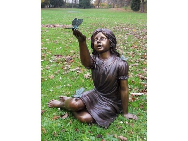 Bronze figure. Girl with butterflies. 71 x 66 x 64 cm.