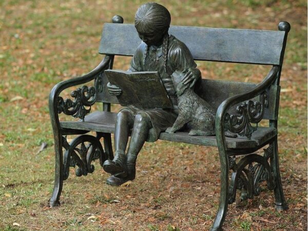 Bronze figure. Girl reading. 80 x 65 x 102 cm.