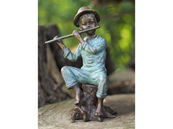 Bronze figure. Flutist boy. 23 x 14 x 10 cm.