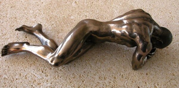 Figure of a man lying down (30 cm)