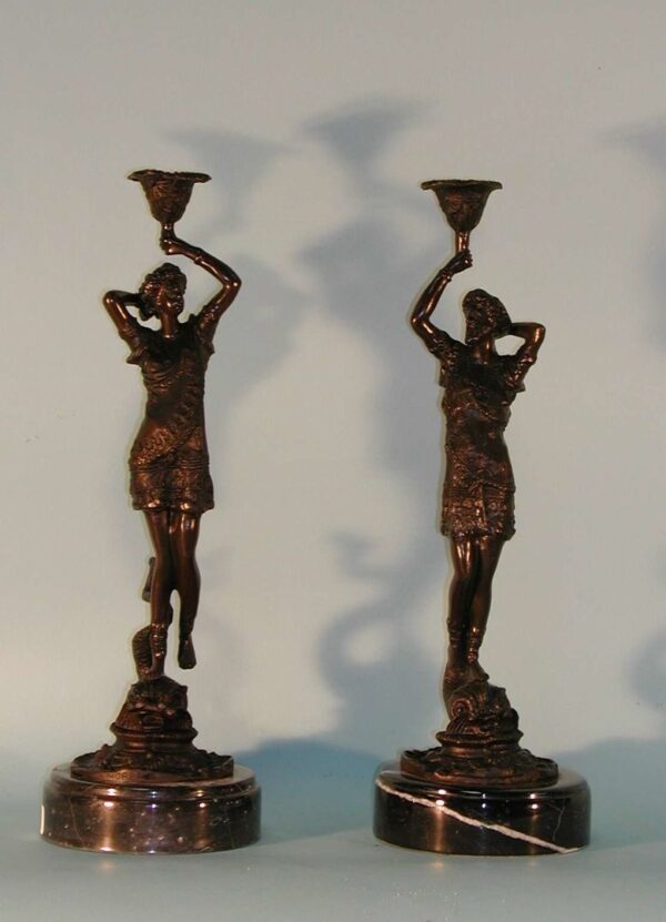 Pair of bronze candlesticks. 13x13x39cm