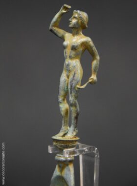 Estrigil de Bronce. 20 cm.