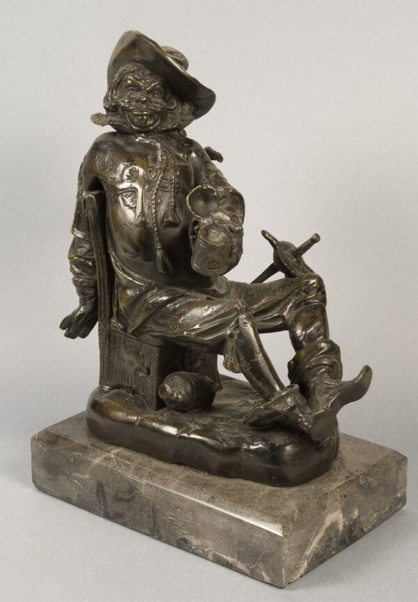 Figure of bronze. Musketeer with jug. 21x13x30cm